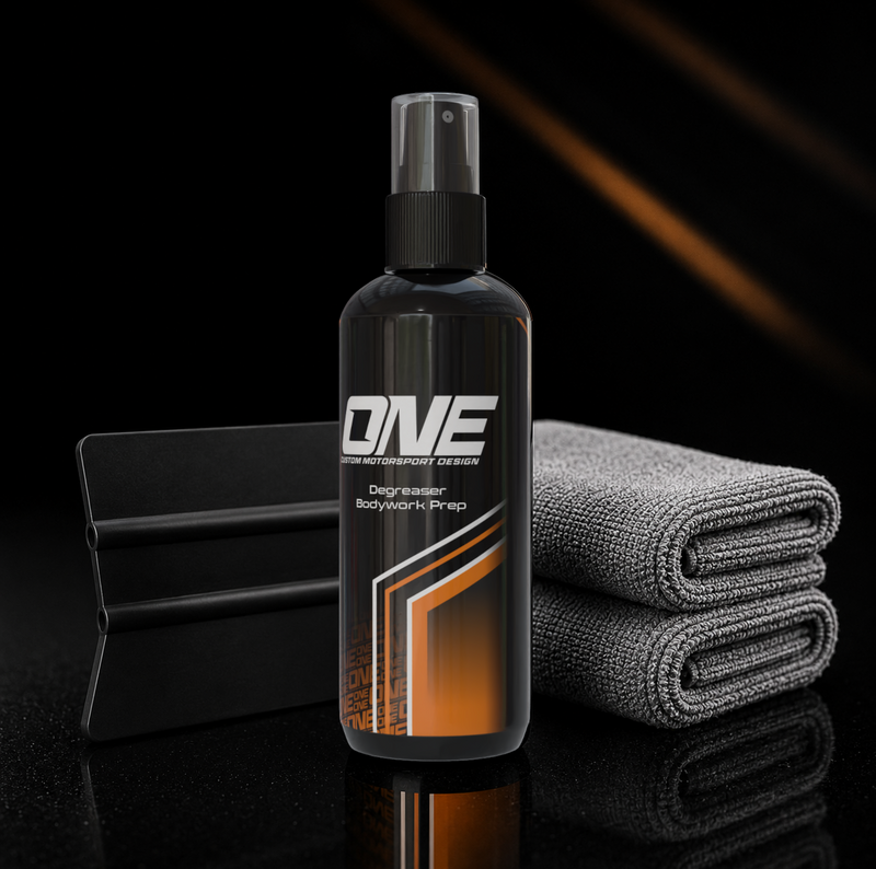 One Custom Design graphic application kit with tools and materials for custom design projects, shown in the image.