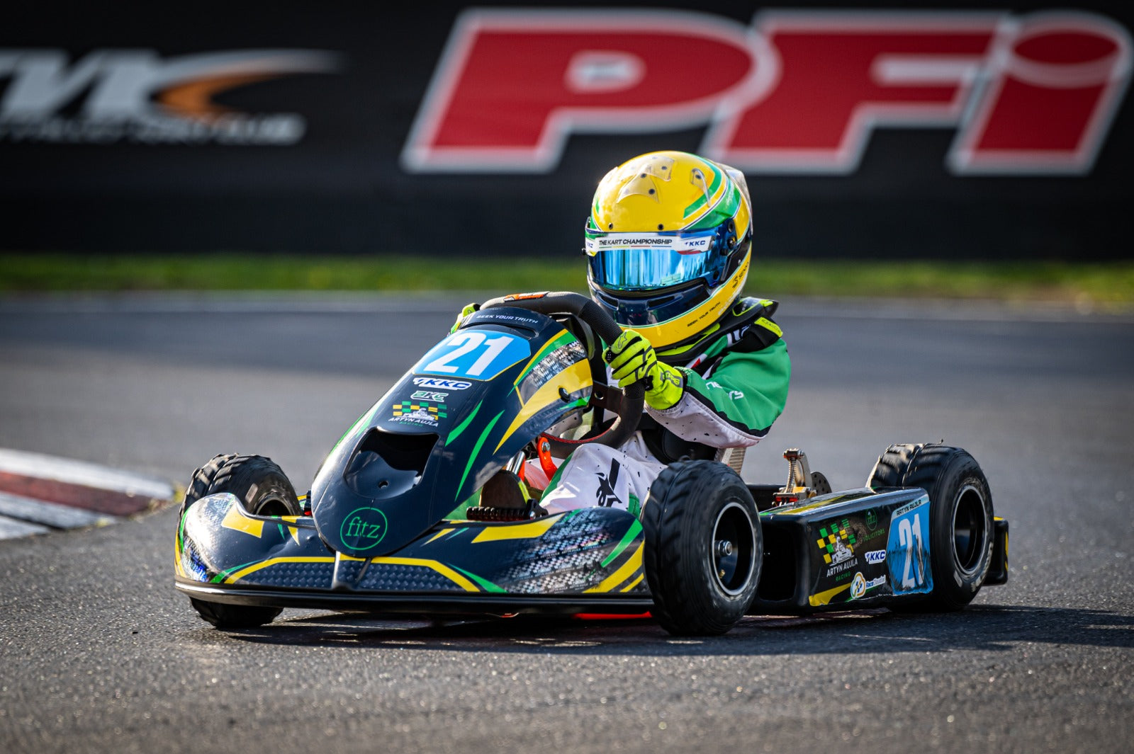 Custom kart graphic design created by One Custom Design, featuring vibrant, personalized graphics on a racing kart.